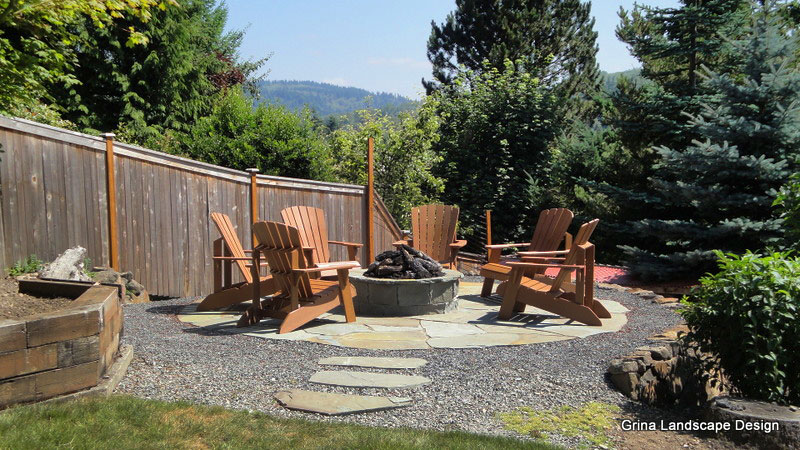 An unused level space in a backyard became an amazing fire pit patio.
